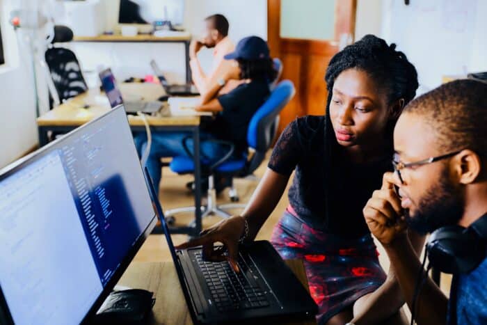 Engineering entrepreneurs working on computer.