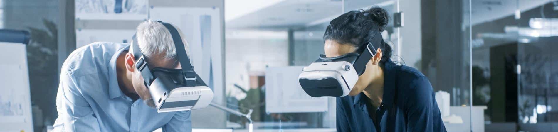 man and woman using virtual reality headsets