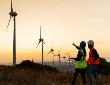 sustainability photo with engineers at a wind farm